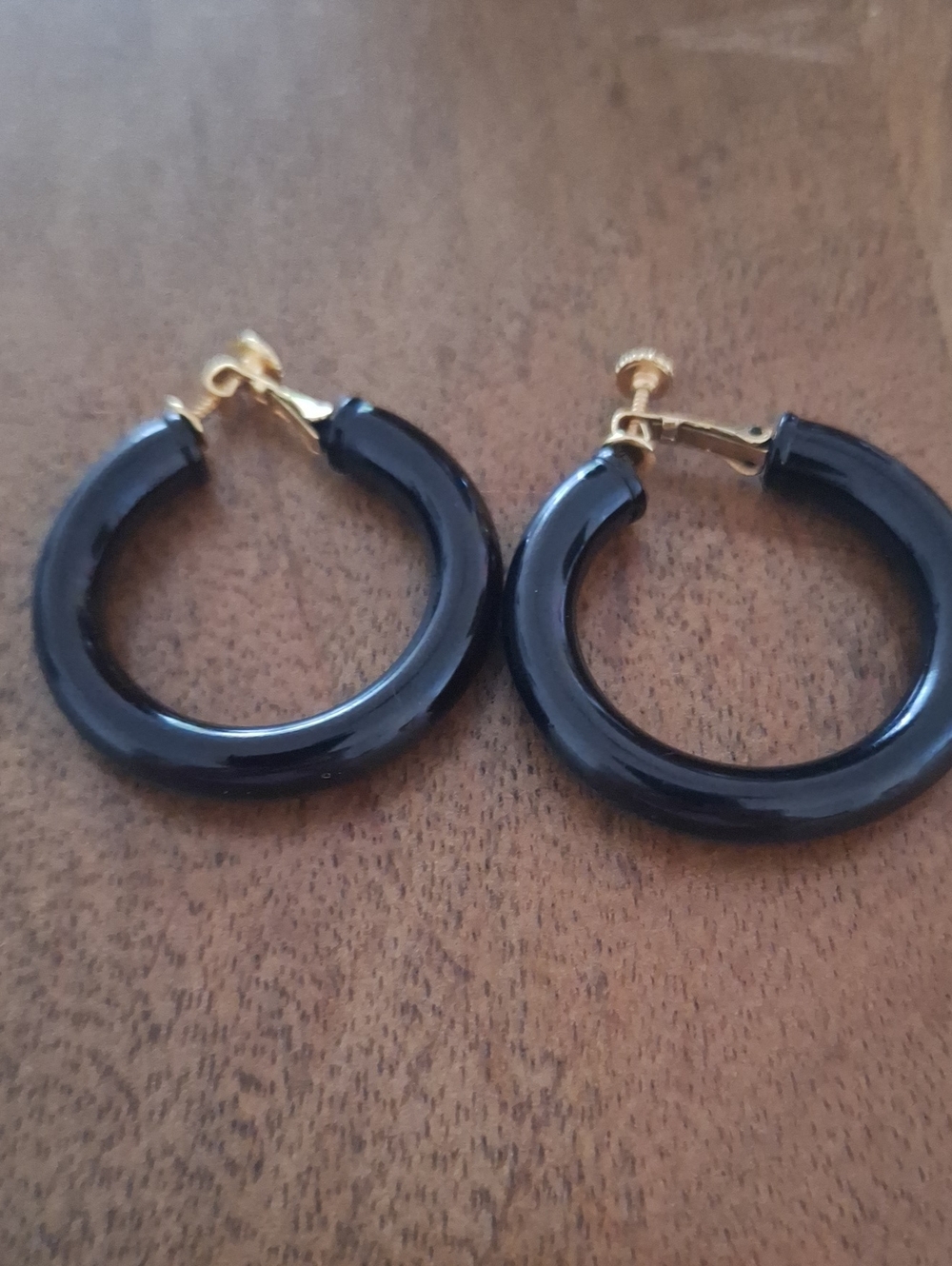 Napier Design Black Hoop Clip-On Adjustable Earrings with Gold Tone Accents